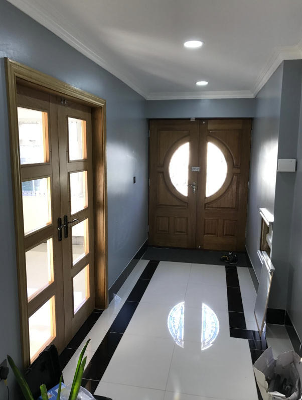 Hallway with oak double doors